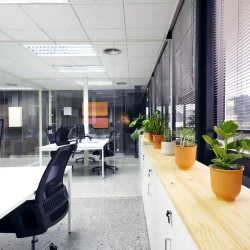 modern-open-space-office-with-computer-monitors-on-2026-03-19-23-40-51-utc